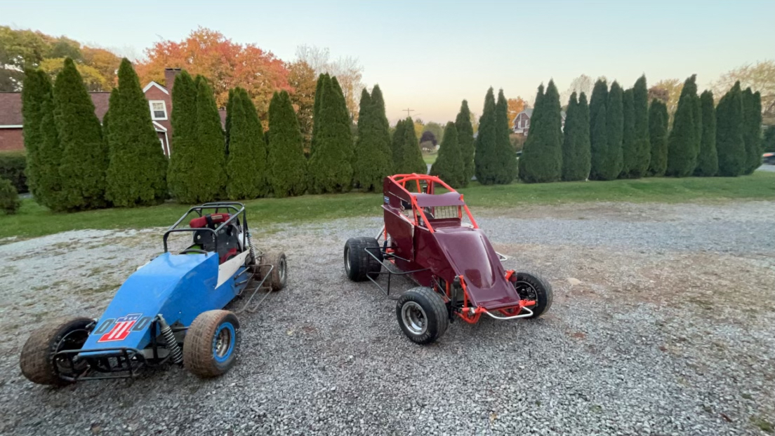 Edge Chassis Micro Sprint car beside a Junior Sprint Car